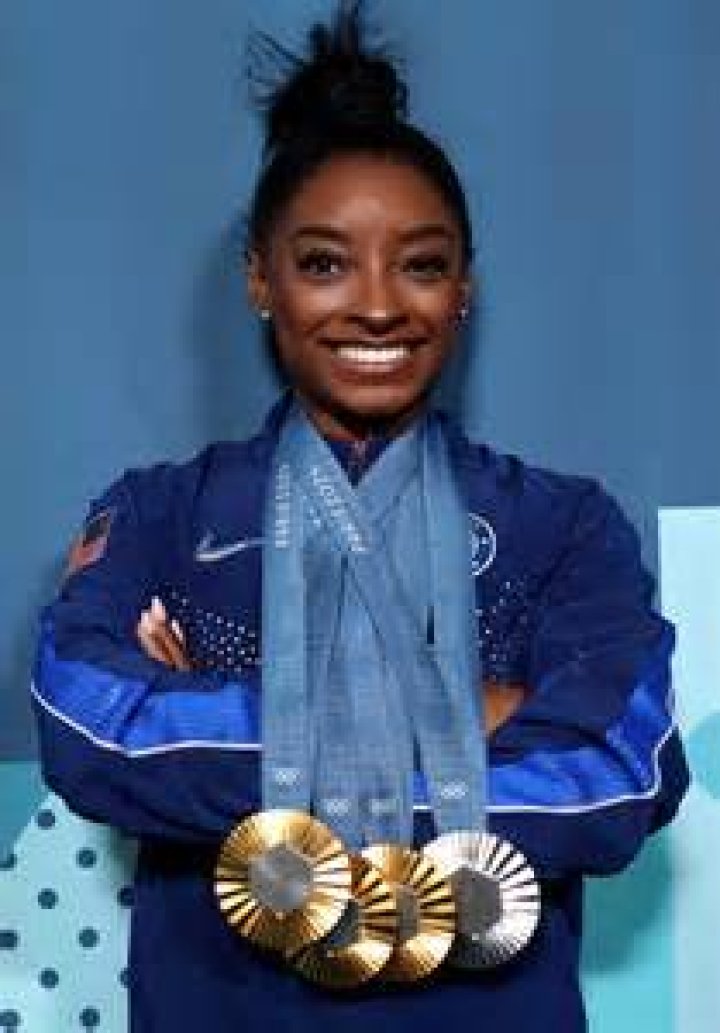 10 Photos Of Simone Biles With Her Parents & Siblings