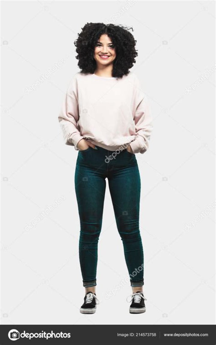 a person standing in the middle of a field with a quote above it that