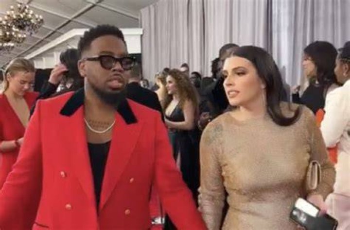 Chandler Moore's Wife Stuns In Faith-Inspired Dress At Grammys 2024