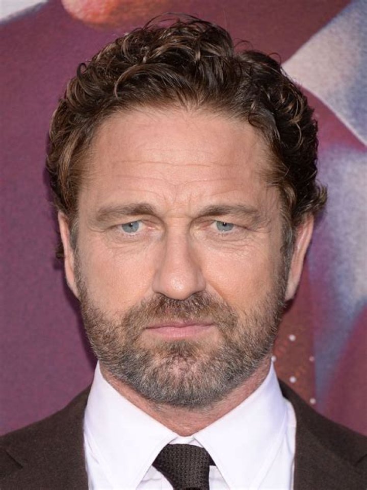 Gerard Butler Had to Glue His Right Ear Back to Film His 'Tomb Raider