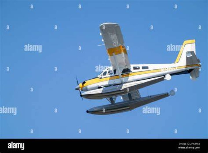 Issaquah, Washington State, USA. Kenmore Air charter float plane flying