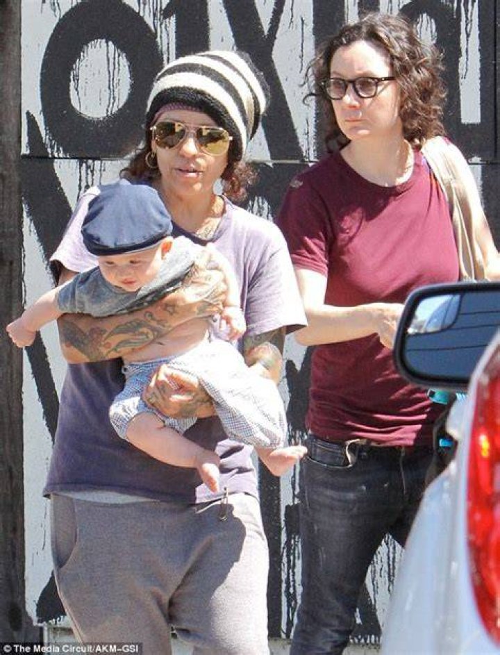 Linda Perry keeps a tight hold on son Rhodes with wife Sara Gilbert