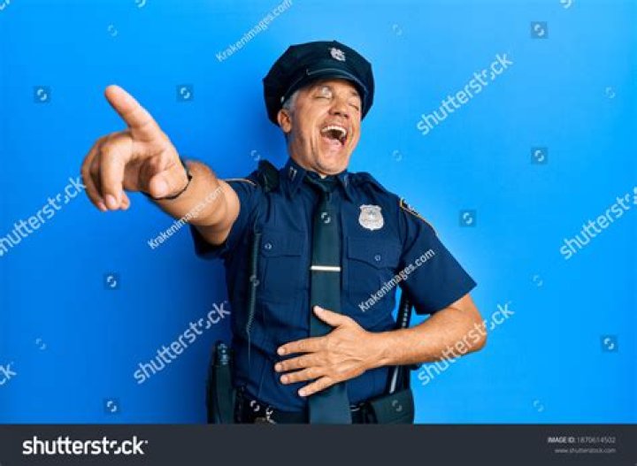 Police Officer Laughing stock photo. Image of enforcement 7051920