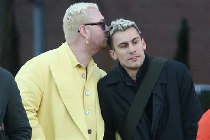 Sam Smith cozies up to new man Francois Rocci in London