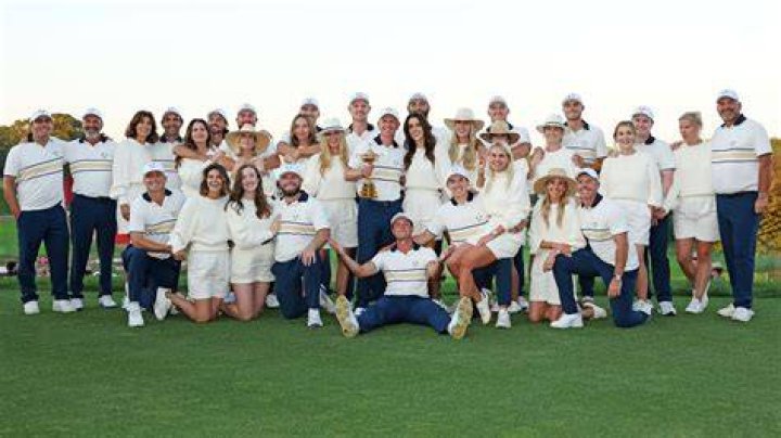 Single Ryder Cup star Viktor Hovland beams as he is kissed by team