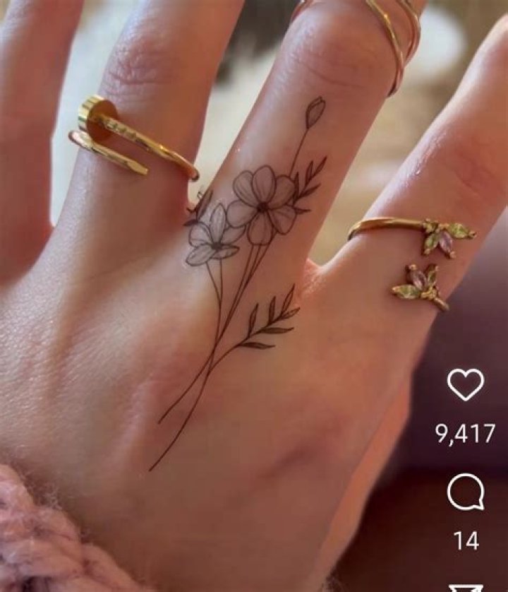 Uncover The Enchanting World Of Flower Finger Tattoos