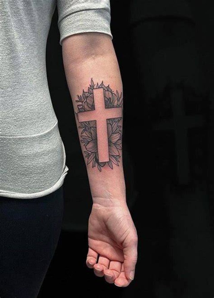 Unveiling The Symbolism And Significance Of Arm Cross Tattoos