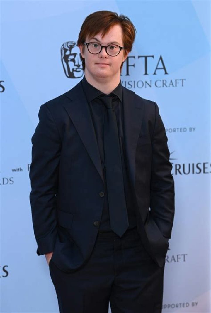What has Daniel Laurie starred in and who is his famous parent? Metro