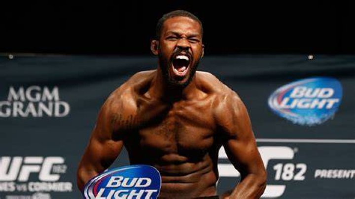 Who does Jon Jones' brother play for in the NFL?