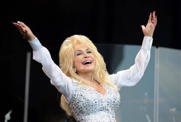 Why does Dolly Parton wear long sleeves